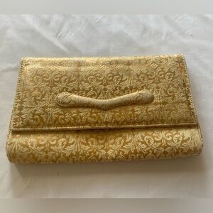 Vintage embossed leather clutch